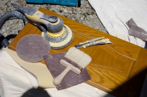 Sanding and removing old and defective coatings